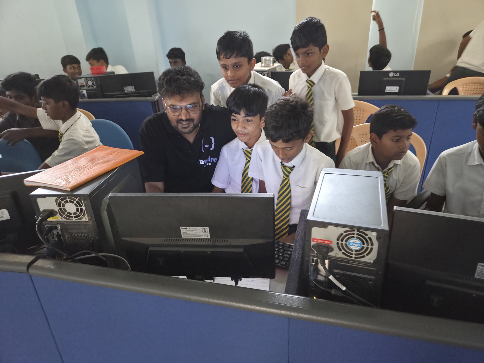 A Rewire instructor guiding students at Shakthi International School, Coimbatore