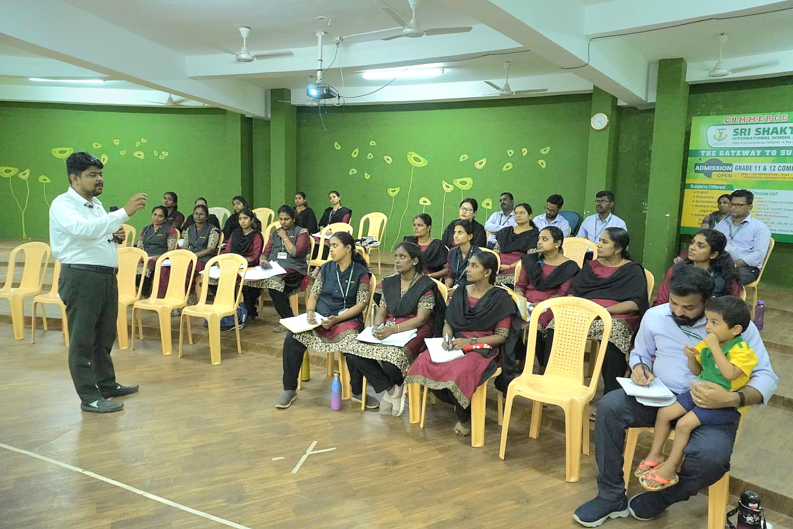 A Rewire instructor training teachers to run AI sessions at Sri Shakthi International School